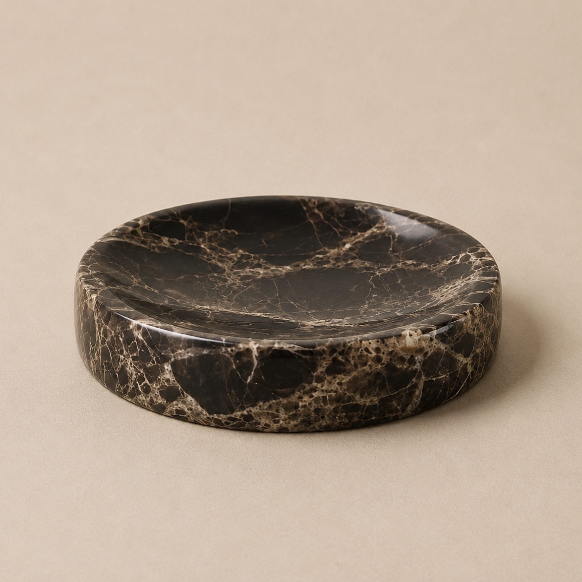 Marble tray with black and white pattern on a beige background